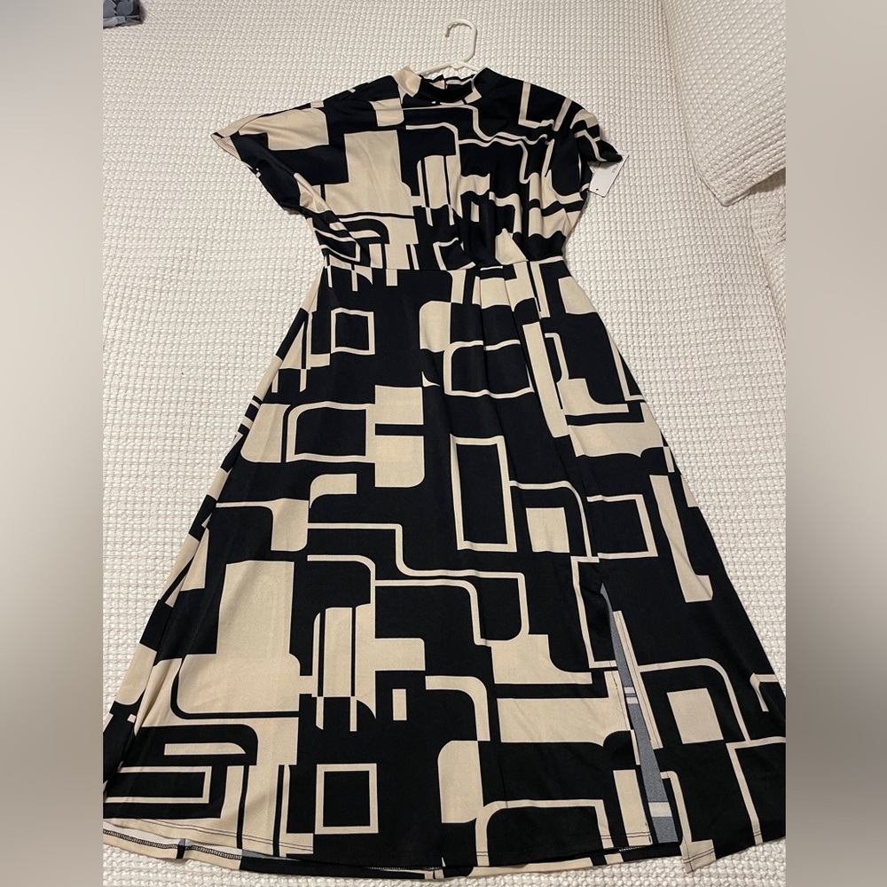 Asymmetrical print dress.